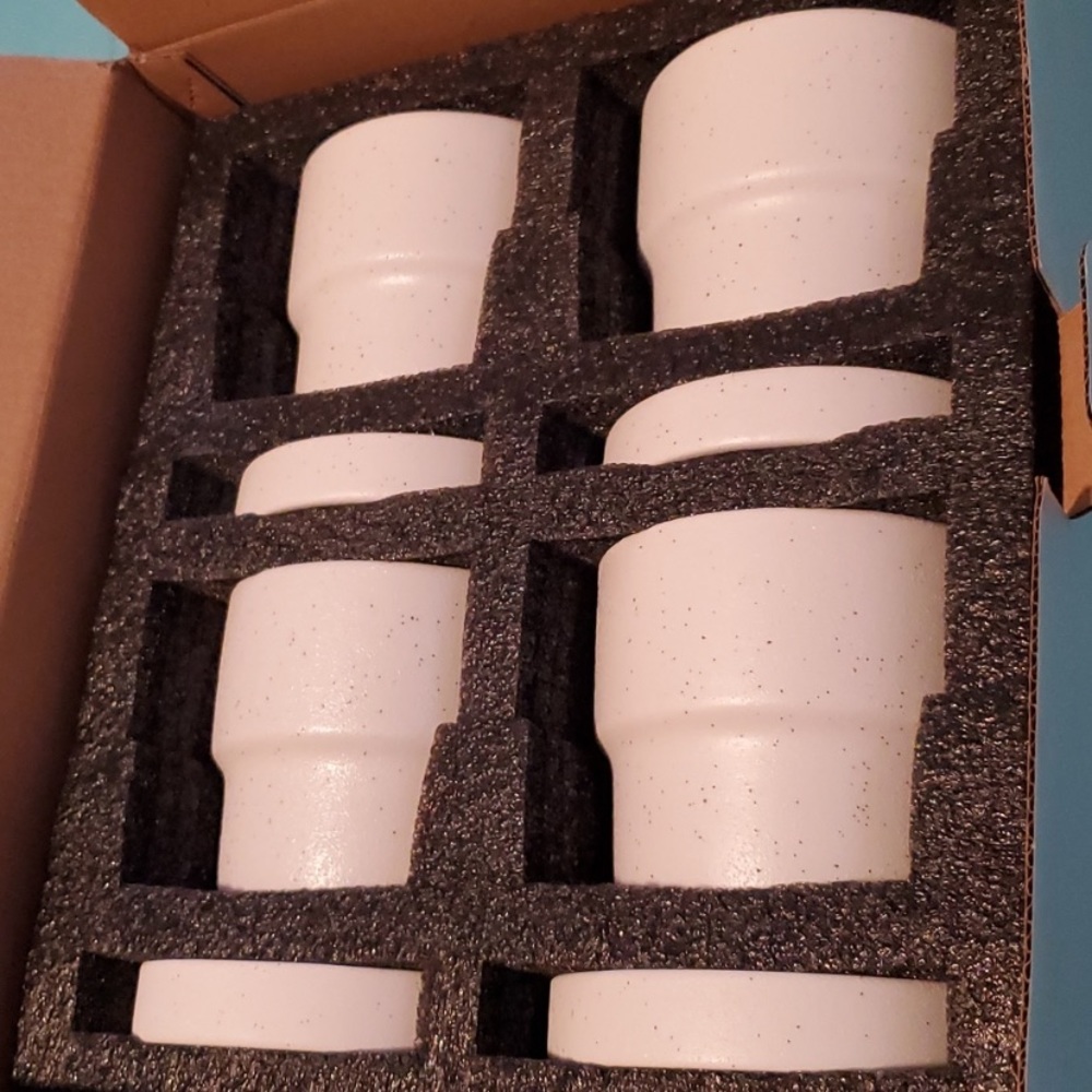4 planter  pots with separate water dishes